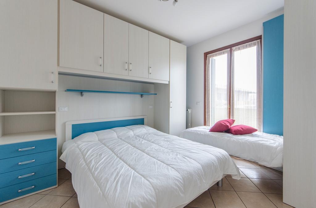Residence Villaggio Dei Fiori Con Piscina E Posto Spiaggia Incluso Caorle Pokoj fotografie