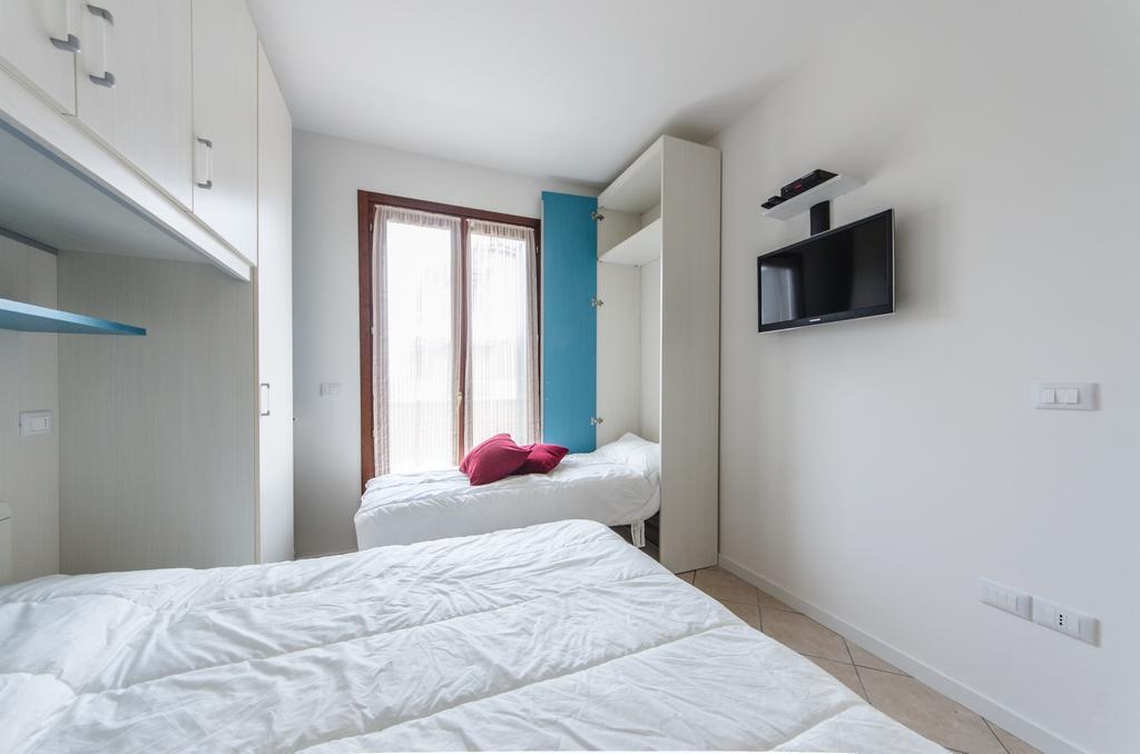 Residence Villaggio Dei Fiori Con Piscina E Posto Spiaggia Incluso Caorle Pokoj fotografie